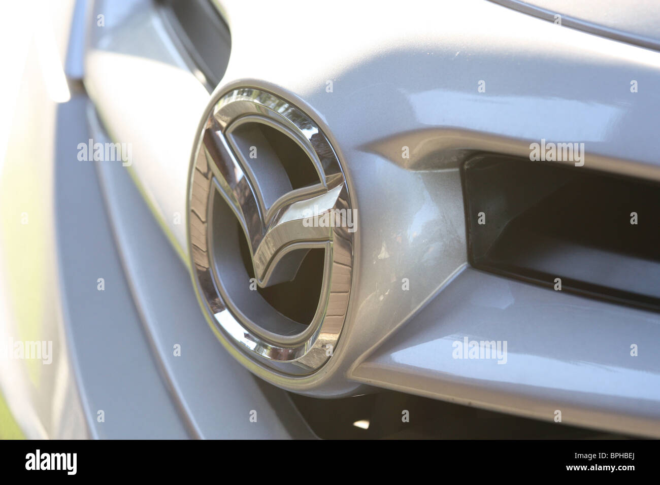 Logo mazda d'argent Banque D'Images