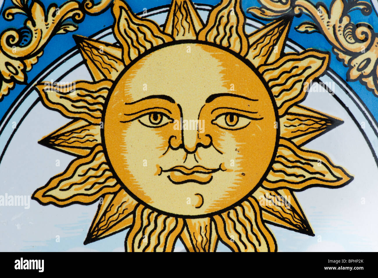 Soleil peint sur un carreau de céramique Banque D'Images