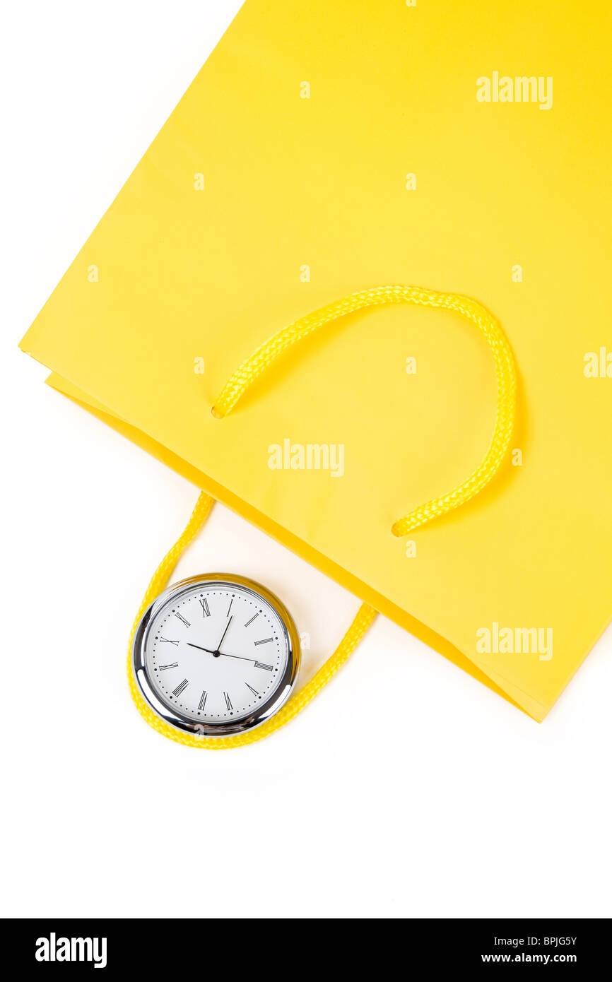 Sac jaune et de l'horloge, concept de Shopping Time Banque D'Images