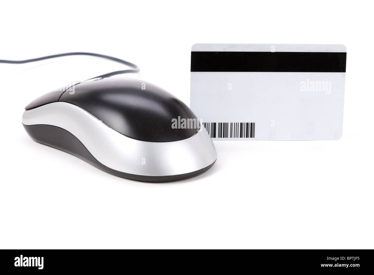 Carte de données numériques en plastique et souris d'ordinateur close up Banque D'Images