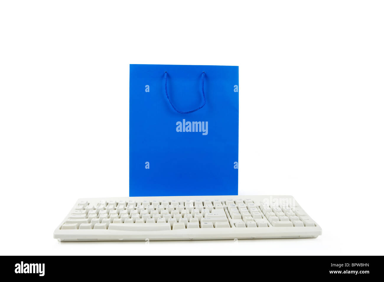 Sac shopping bleu et clavier de l'ordinateur, le magasinage en ligne Banque D'Images