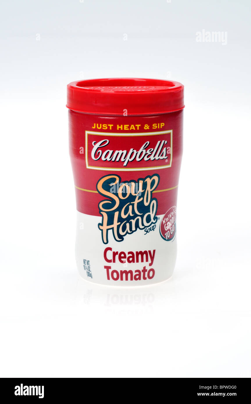 Récipient de Campbell's Tomato Soup à aller sur fond blanc, découpe. Banque D'Images