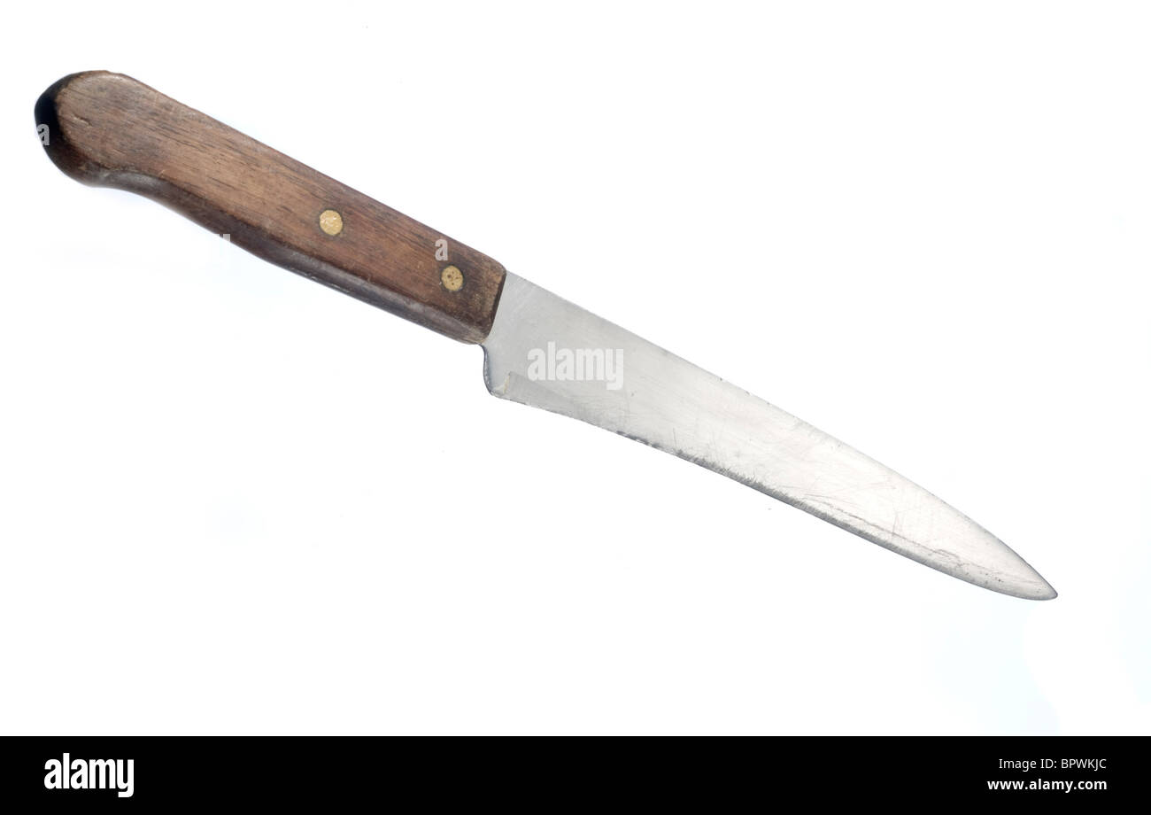 Un vieux couteau de chef qui a été affinés jusqu'à ce que la lame soit porté hors de forme Banque D'Images