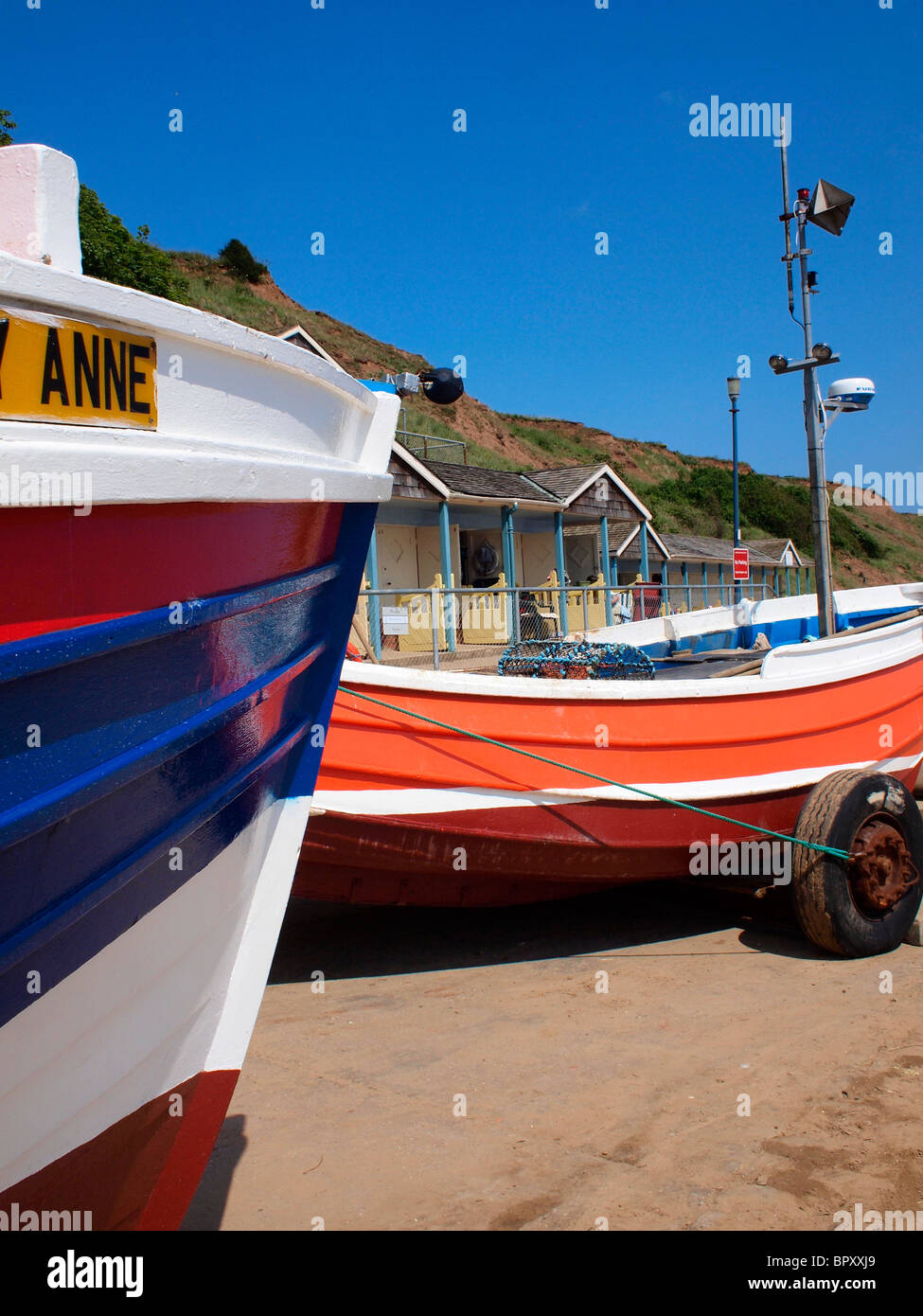 Coble Bateaux de pêche sur l'atterrissage Coble Filey, Filey, East Yorkshire, de la côte nord de l'Angleterre Banque D'Images