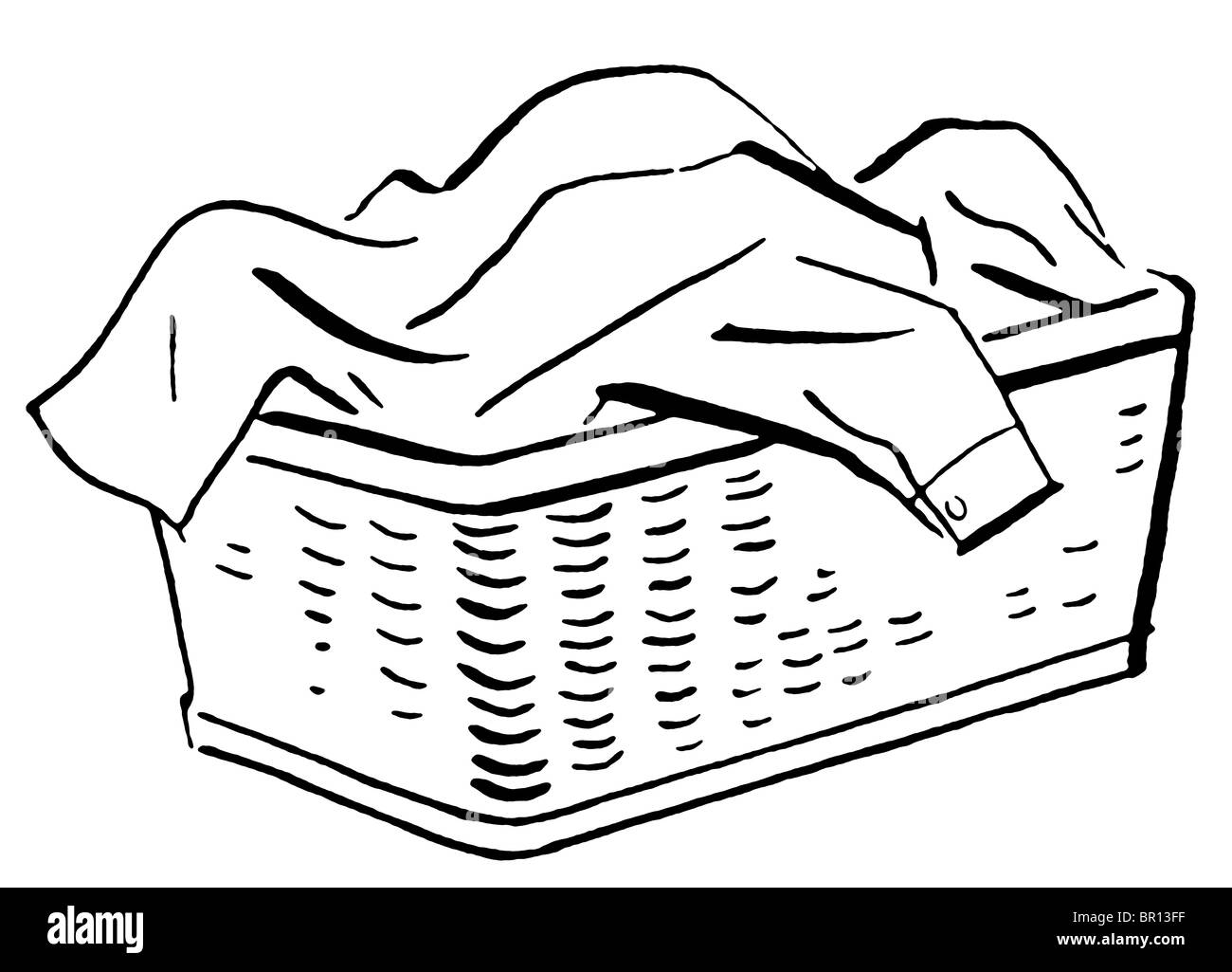 Une version noir et blanc d'un panier plein de linge Banque D'Images