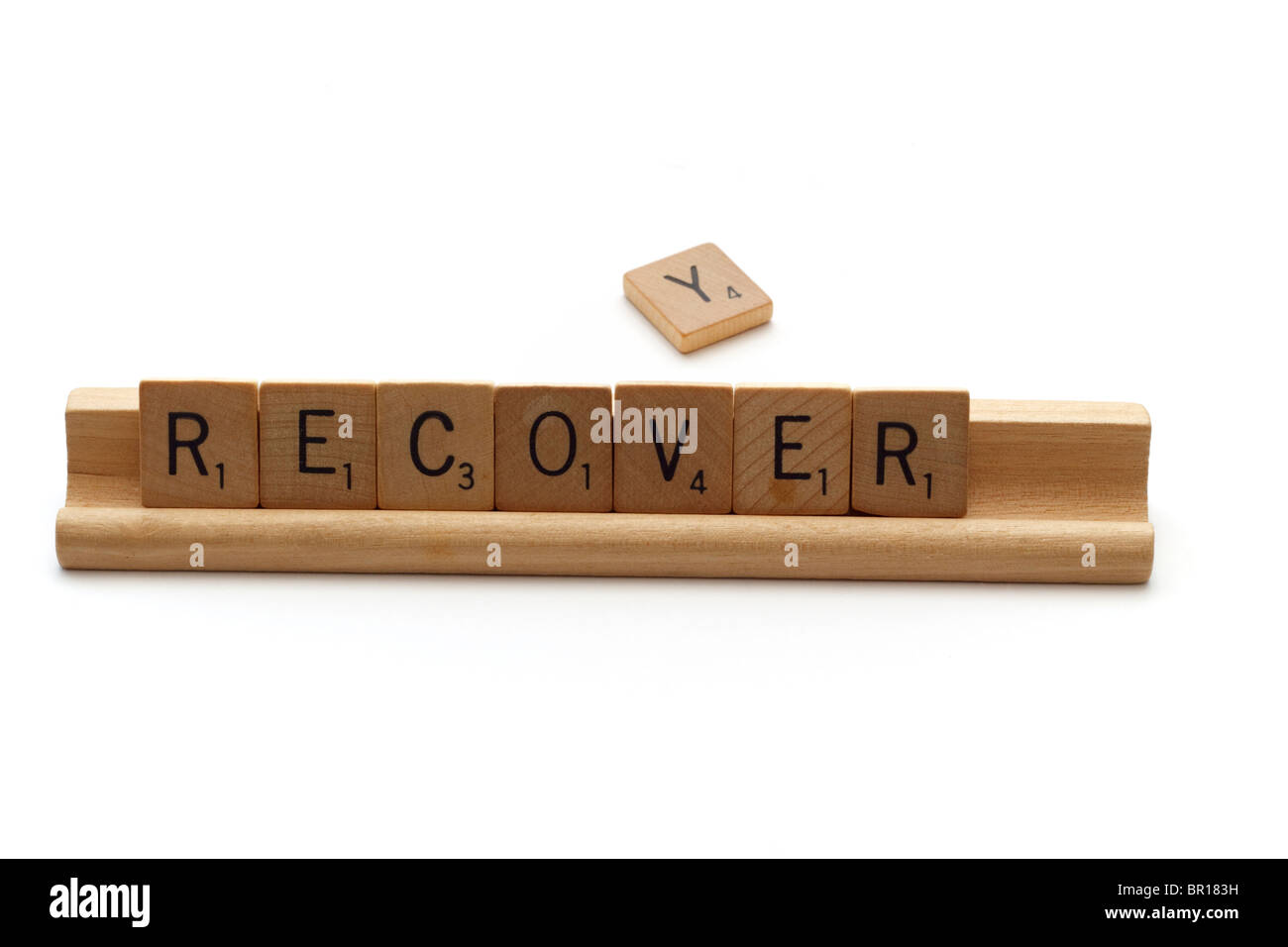 Récupération incomplète concept illustré à l'aide de carreaux de Scrabble Banque D'Images