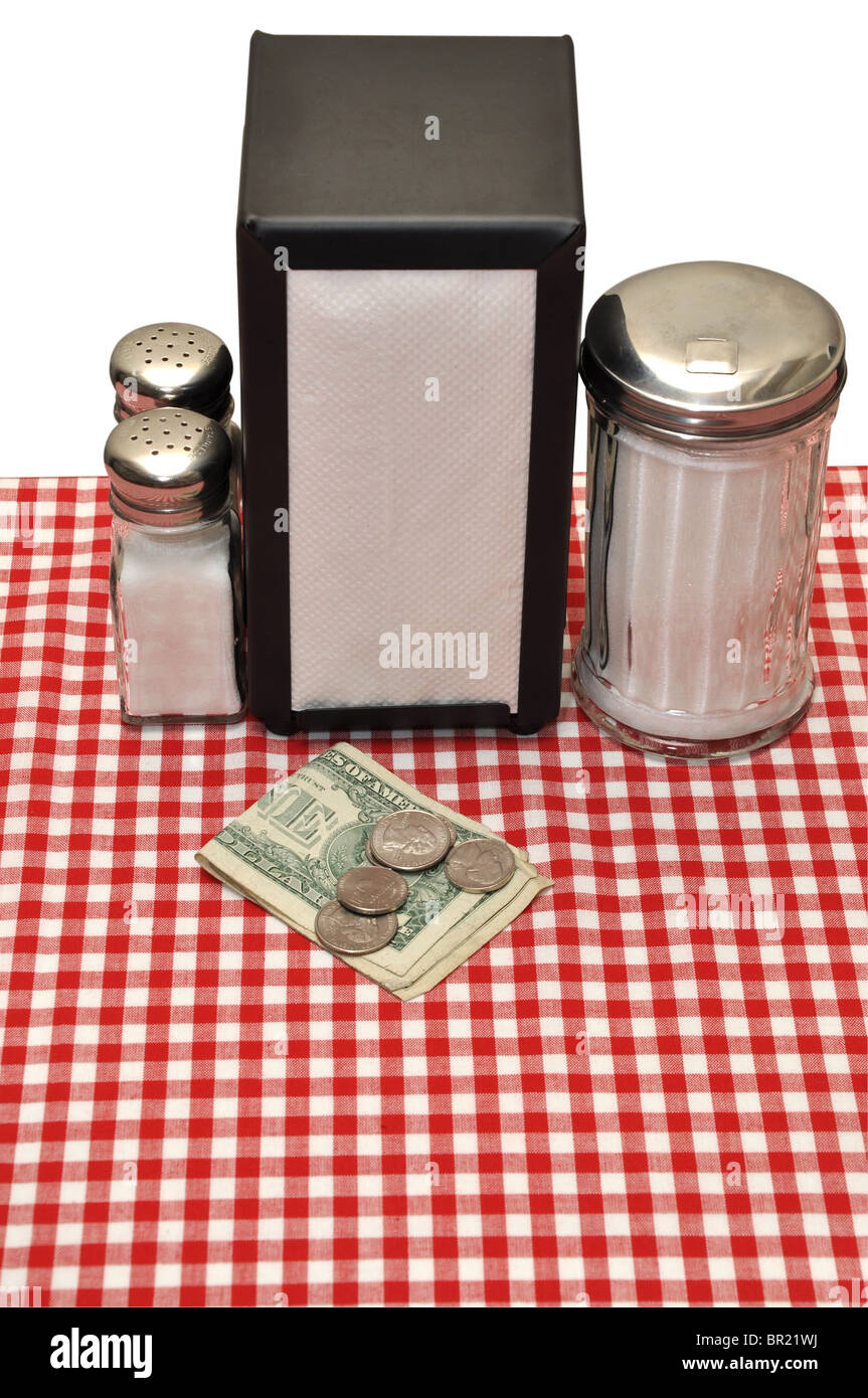 Astuce sur table au restaurant. Isolé sur fond blanc avec chemin de détourage. Banque D'Images