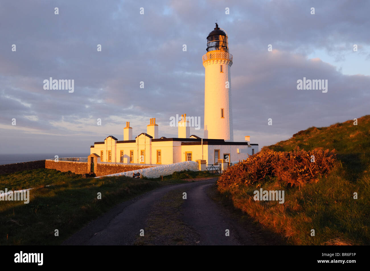 Mull of Galloway phare au lever du soleil, Dumfries et Galloway, Écosse Banque D'Images