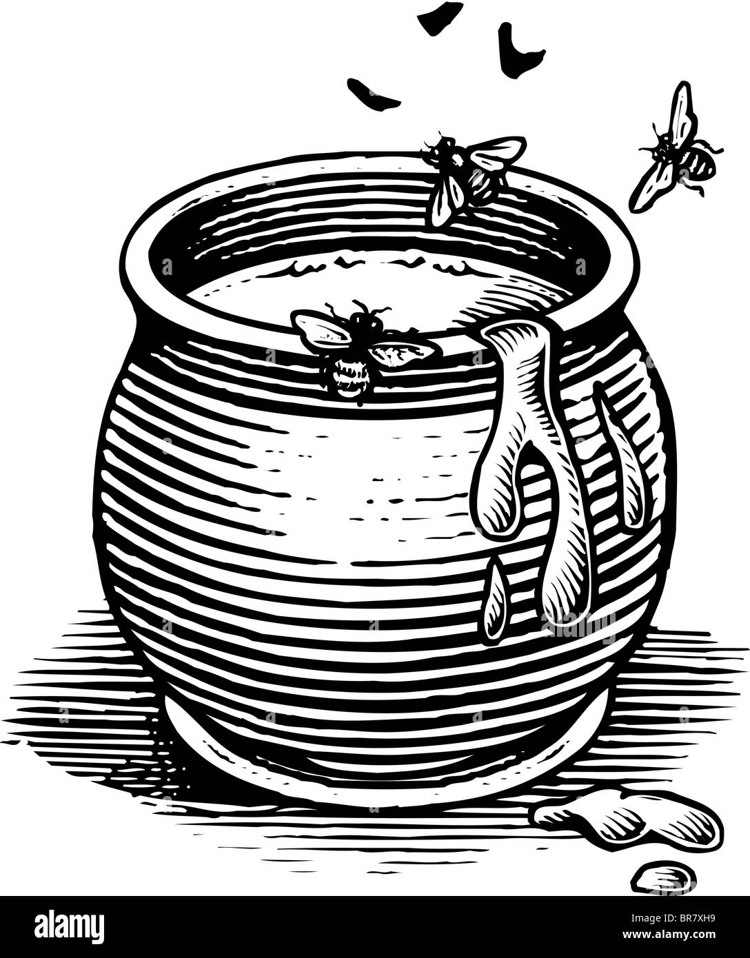 Les abeilles dans un pot de miel Banque D'Images