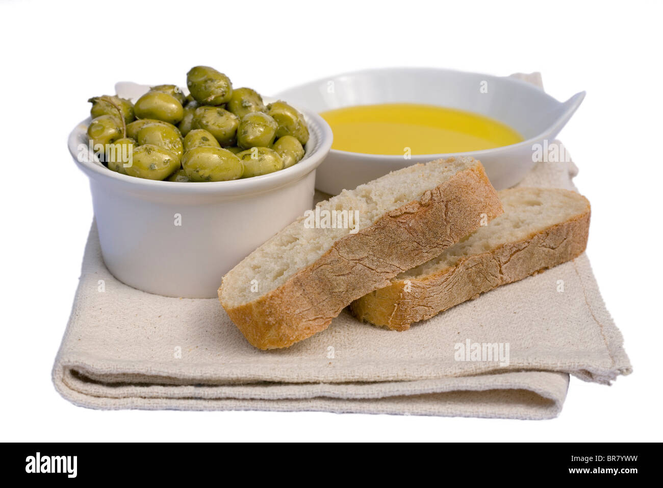 Pain italien avec l'huile d'olive et olives vertes Banque D'Images