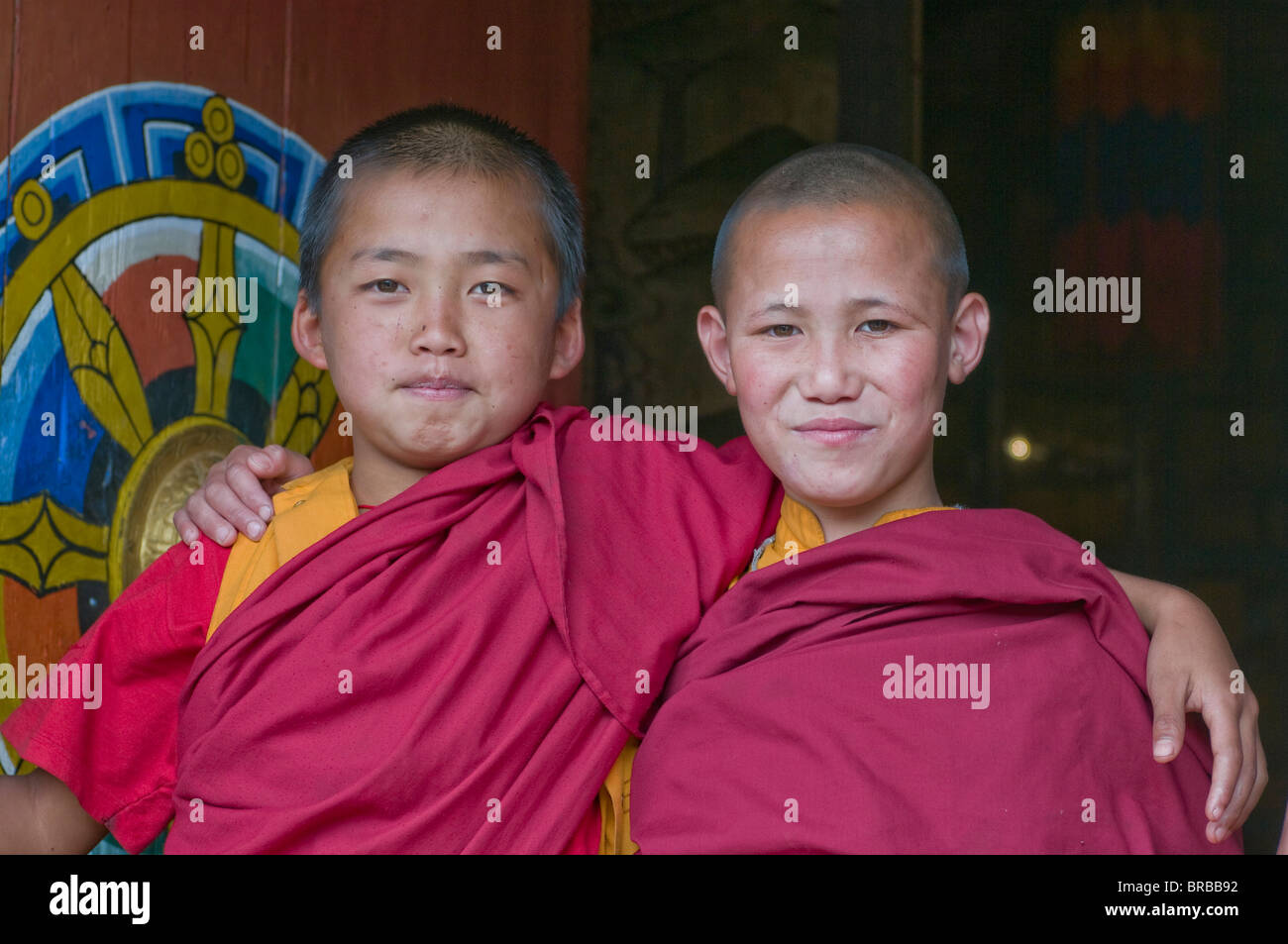 Heureux les moines bouddhistes, Chimi Lhakhang, Bhoutan Banque D'Images