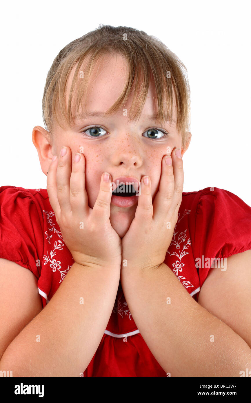 Petite fille inquiète avec bouche ouverte isolated on white Banque D'Images
