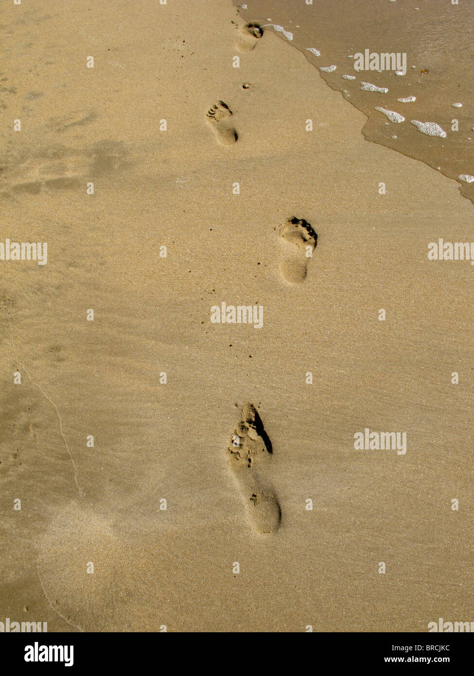 Des traces de pas dans le sable sur l'île de Ré, France Banque D'Images