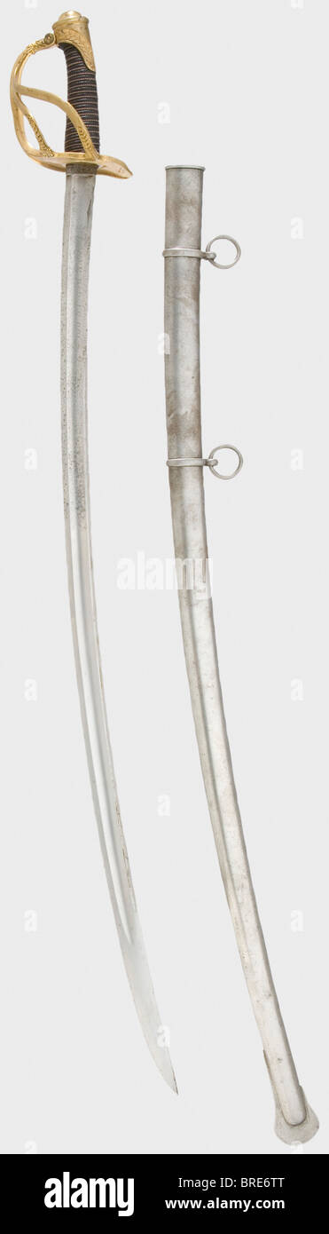 un sabre français 1822 pour élèves de l'Ecole Spéciale de St Cyr, daté 1825  lame incurvée à la Montmorency. 'DONNE par LE ROI' est gravé dans le plus  grand sur le côté