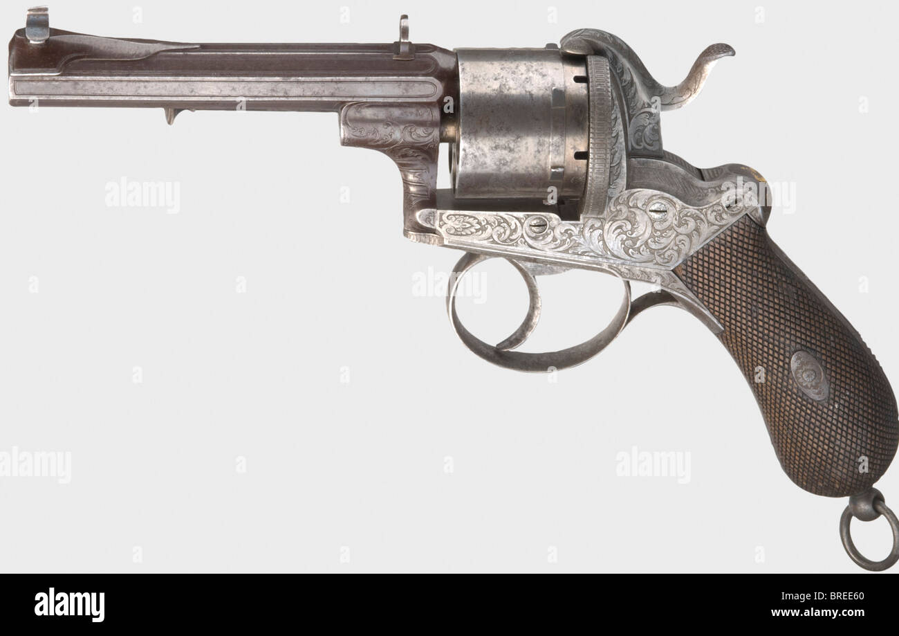 Duc Wilhelm von Braunschweig (1806 - 1884) - un revolver à broche, Lebeda Söhne à Prague, vers 1870, non 7884. Canon octogonal de calibre 11 mm, sur le côté inférieur marqué 'AV. Lebeda Söhne Herzogl=Braunschw=Hofrüstmeister Prag'. Cylindre à six coups, panneaux de poignée en bois, boucle de cordon. Corps et boîtier de l'éjecteur brunis, un peu en caoutchouc, avec décoration fine. Cadre, marteau et cadre de préhension avec gravure arabesque. Sur l'incrustation dorée « W » du cadre de la poignée (légèrement usée par nettoyage). Légères marques d'âge et d'utilisation, éjecteur légèrement tordu. Longueur 26 cm. Wilhelm est venu au trône , Banque D'Images