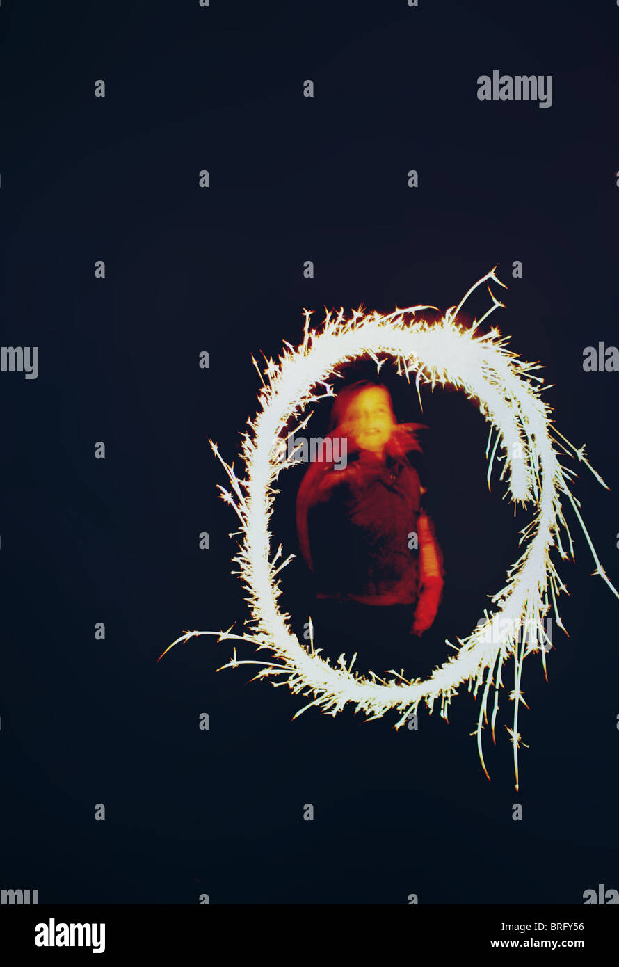 Girl with sparkler Banque D'Images