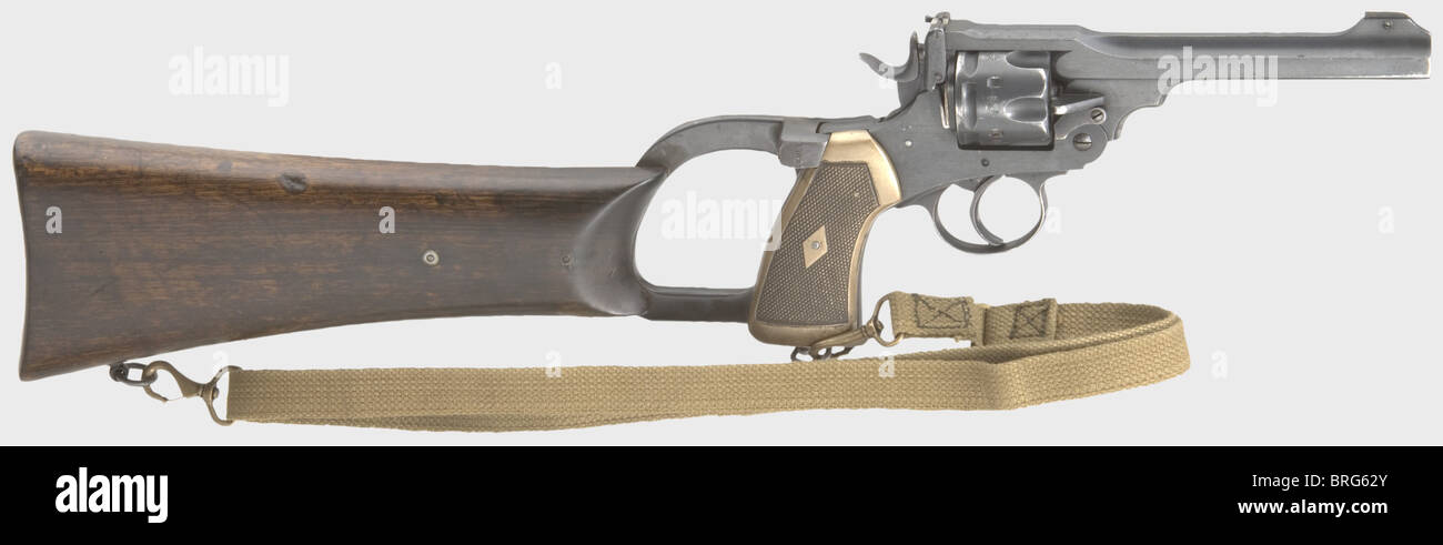 Un Revolver de service Webley Mark VI avec fixation de l'épaule, (« Revolver de tranchée »), cal..455, no.194135.numéros correspondants.alésage brillant, longueur du corps 6'.6-shot.regard arrière réglable.fente au bas de la poignée pour fixation de l'épaule.gauche sur le pont de châssis marqué « MARK VI »,au bas du cadre « Webley Light Weapie ».marques d'usure sur divers brevets.VI.1916.marque de finition de finition de finition de peinture de finition de la flèche d'origine Arêtes.presque nouvelle condition.sur la gauche de la poignée en bois épaulière fixé par une plaque en acier ouvré avec le n° de série 15087,fixé à droite par ,droits supplémentaires-Clearences-non disponible Banque D'Images