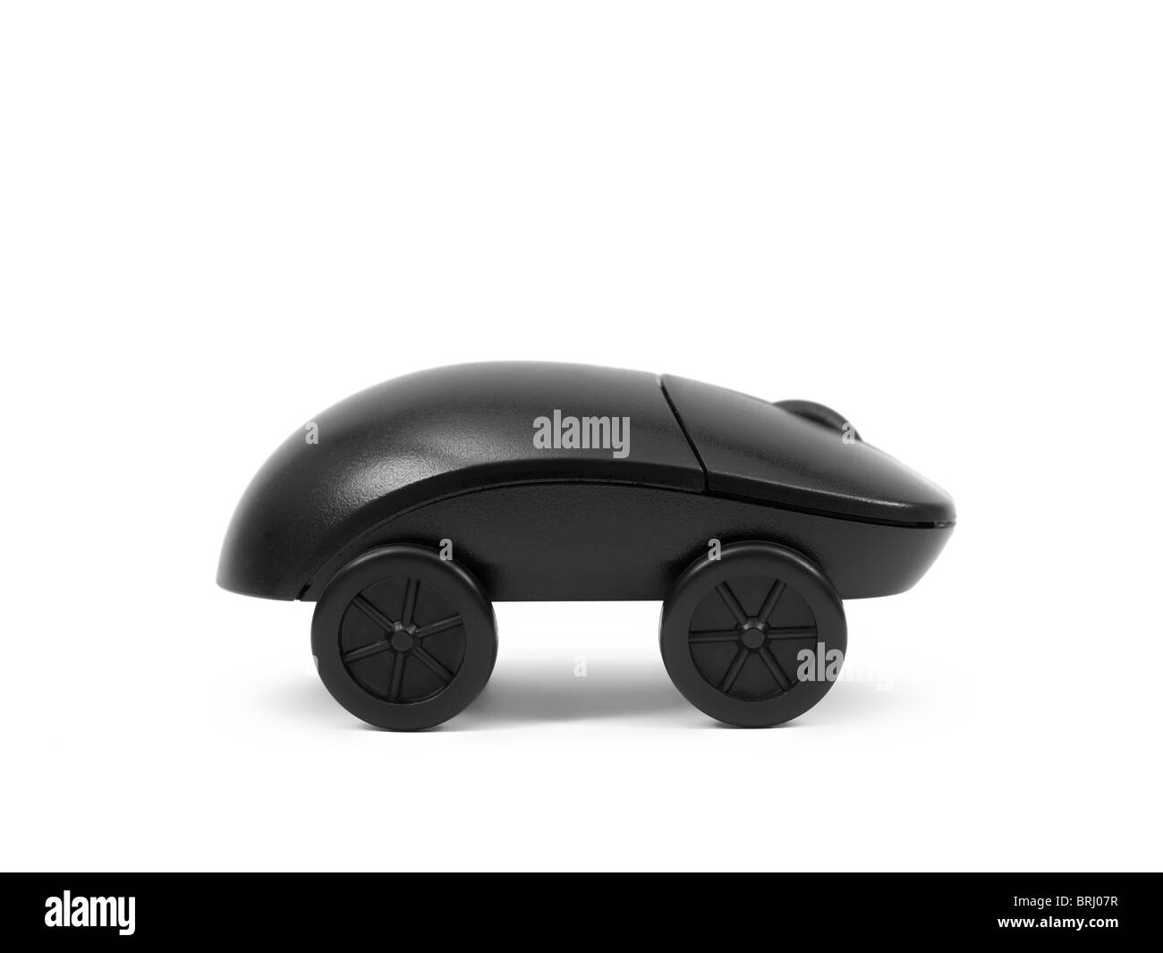 Une souris d'ordinateur sur roues isolé sur fond blanc Banque D'Images