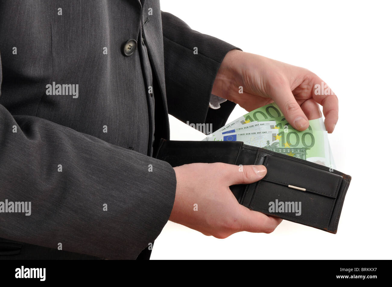 L'homme d'affaires paie en billets en euros, l'arrière-plan financier Banque D'Images
