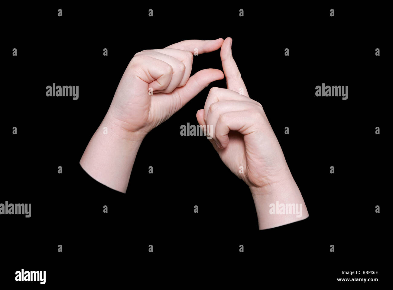 Le mot 'word' dans la langue des signes sur un fond noir Banque D'Images