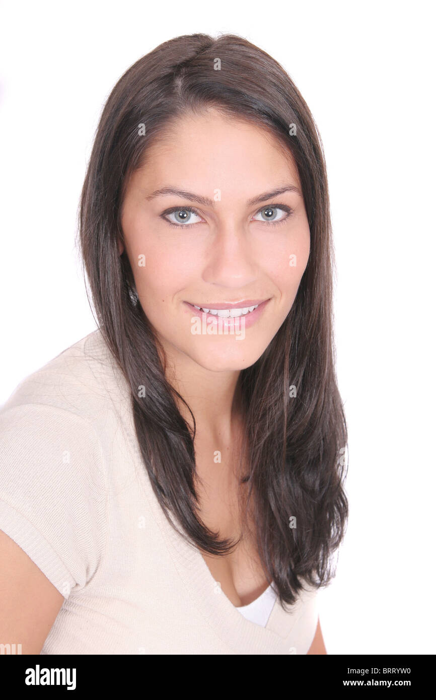 Une jeune femme brune closeup portrait over white Banque D'Images