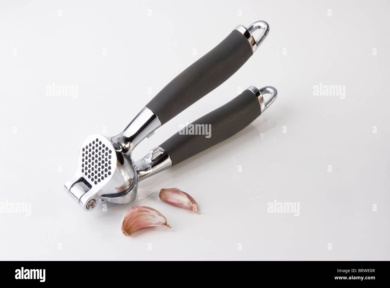 Presse-ail gousse écraser écraser Banque D'Images