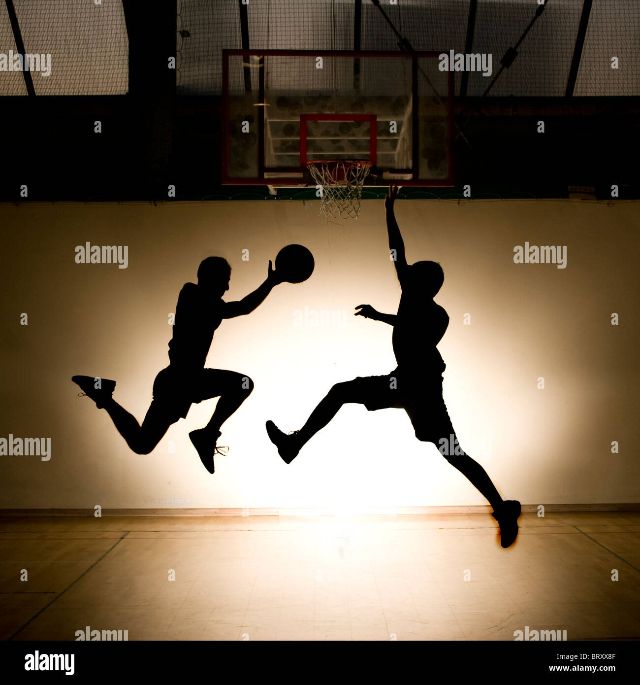 Basket-ball jump - silhouettes noires Banque D'Images