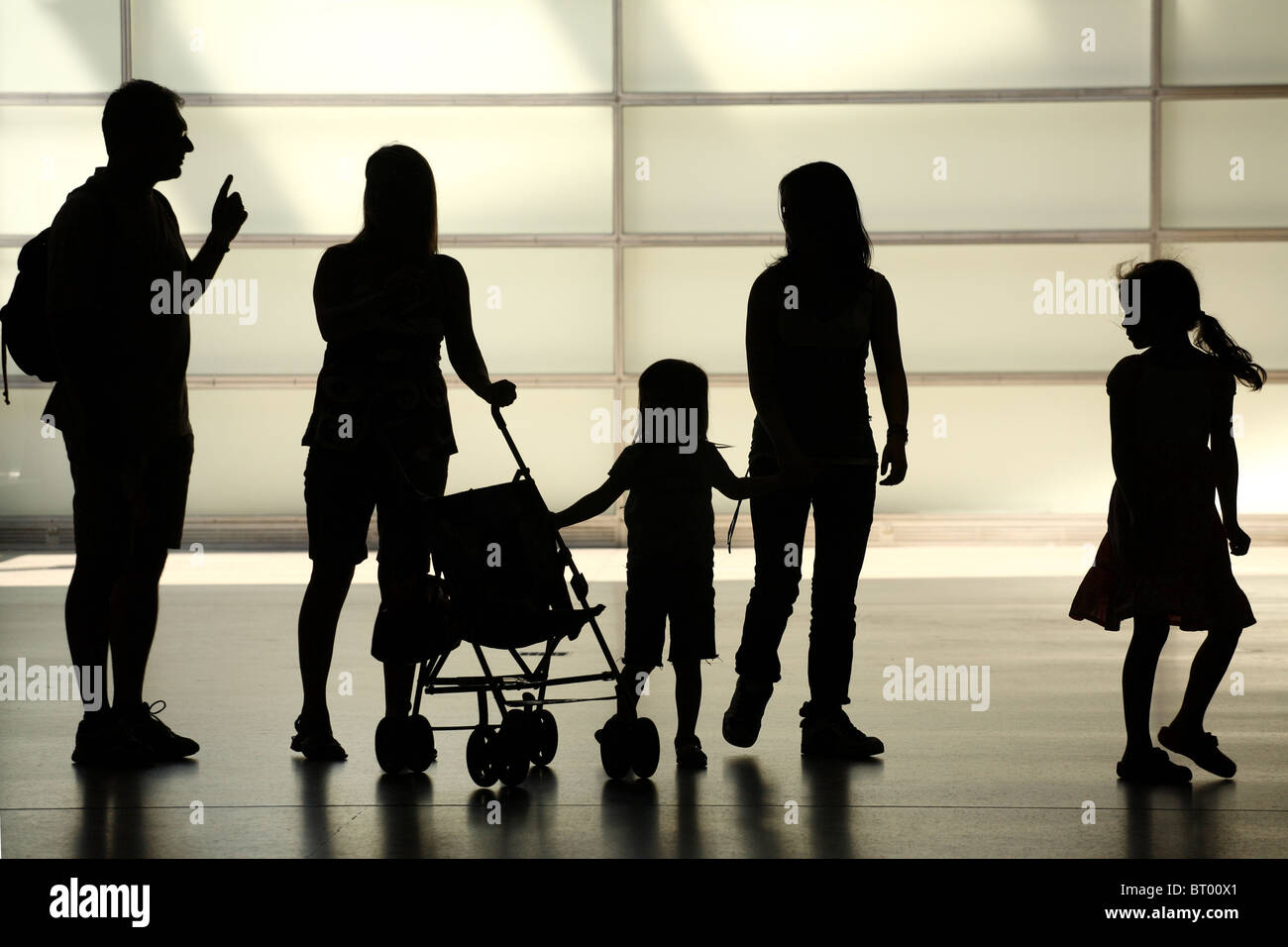 Silhouettes de parents et un enfant Banque D'Images