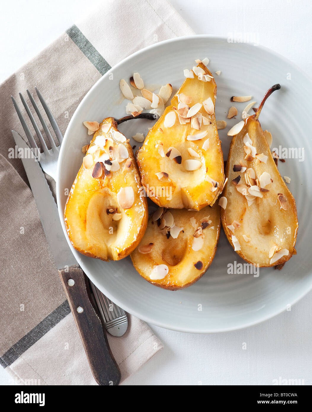 Poires caramélisées aux amandes Banque D'Images