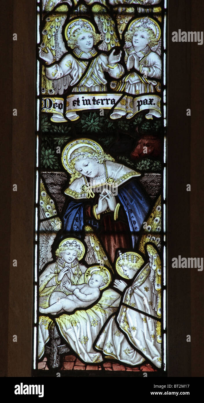 Vitrail par C E Kempe & Co représentant la Nativité, l'église Saint Pierre, Shirwell, Devon Banque D'Images