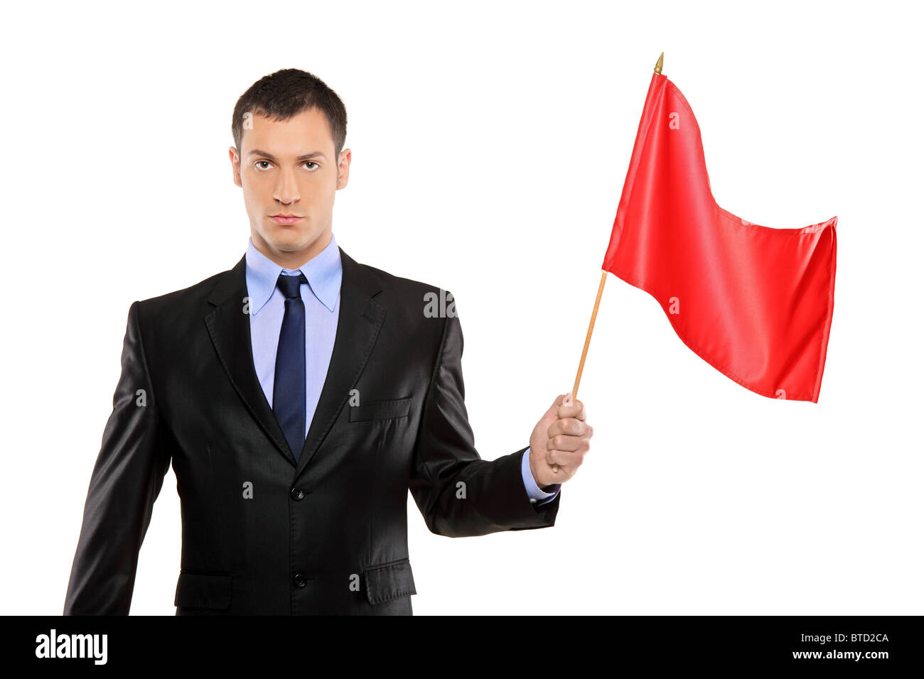 Un portrait d'un jeune homme tenant un drapeau rouge Banque D'Images