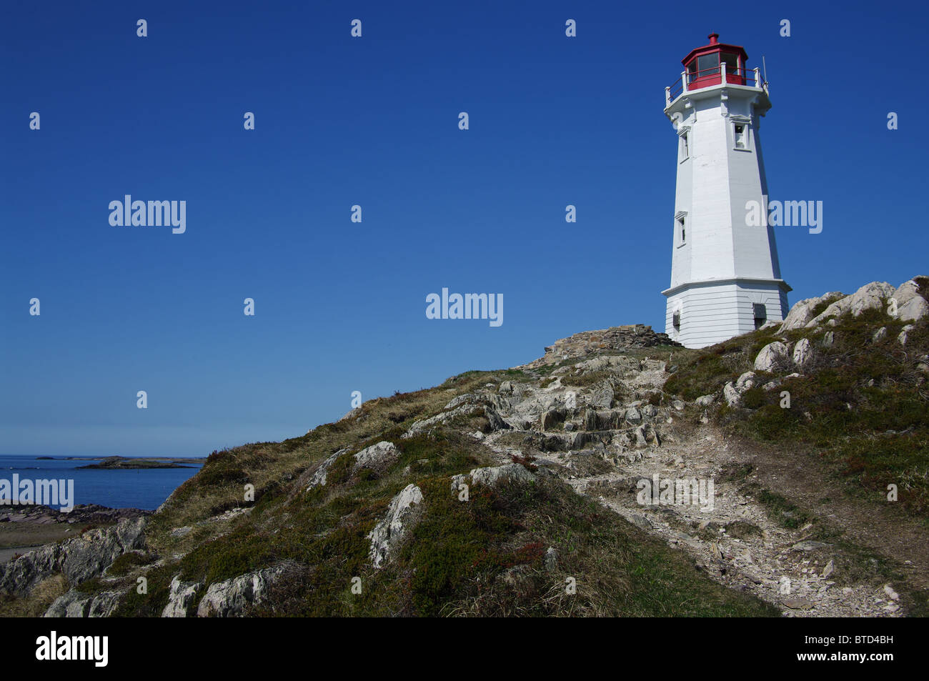 Phare à Louisbourg, en Nouvelle-Écosse, Canada. Banque D'Images