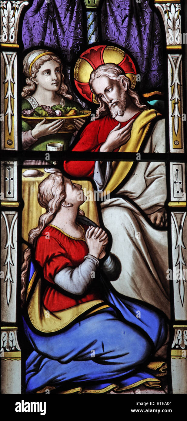 Un vitrail représentant Jésus dans la maison de Marthe et Marie, l'église paroissiale de St Mary Magdalene, Clatworthy, Somerset Banque D'Images