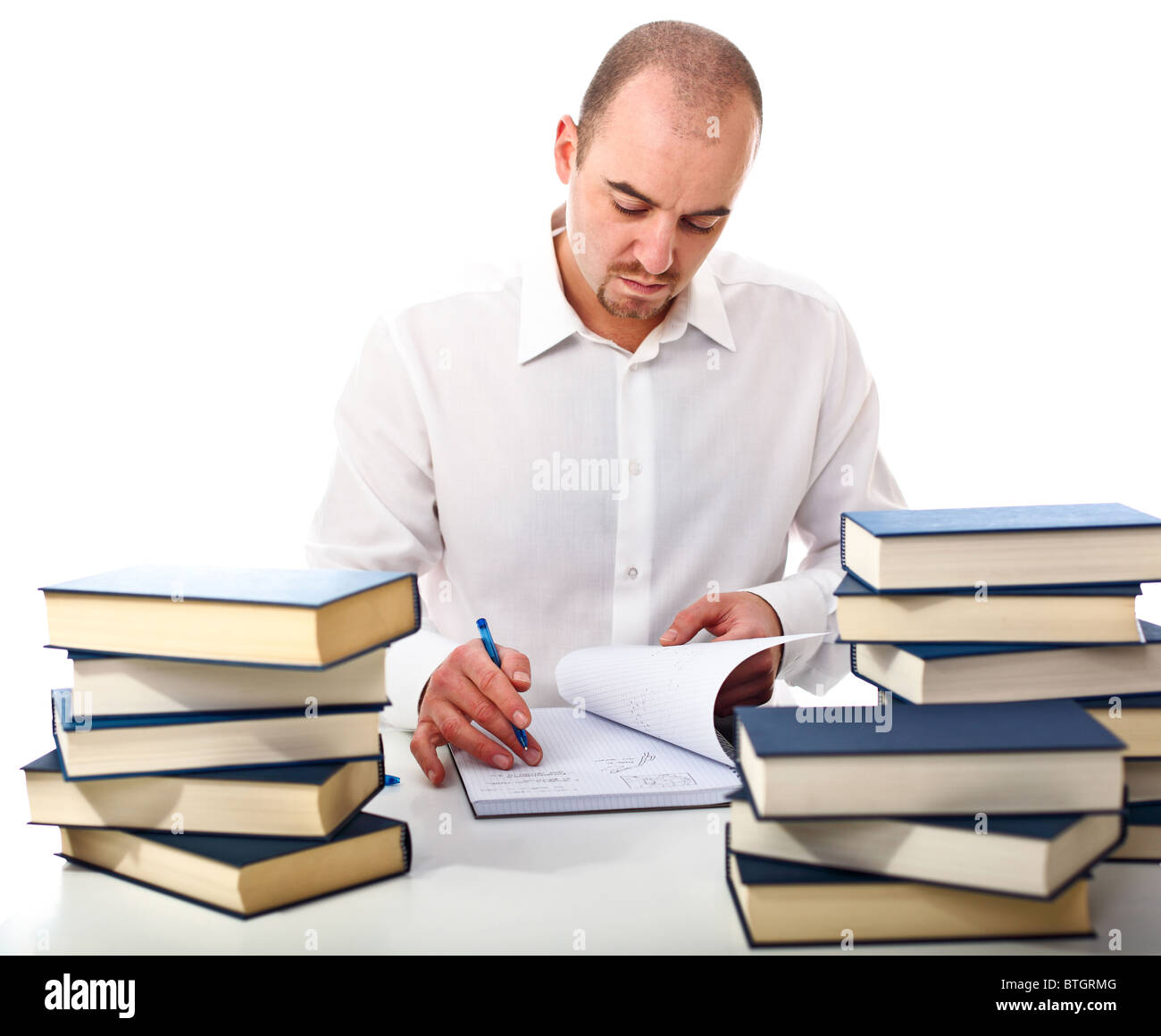 Jeune homme au travail avec beaucoup de réserve isolated on white Banque D'Images