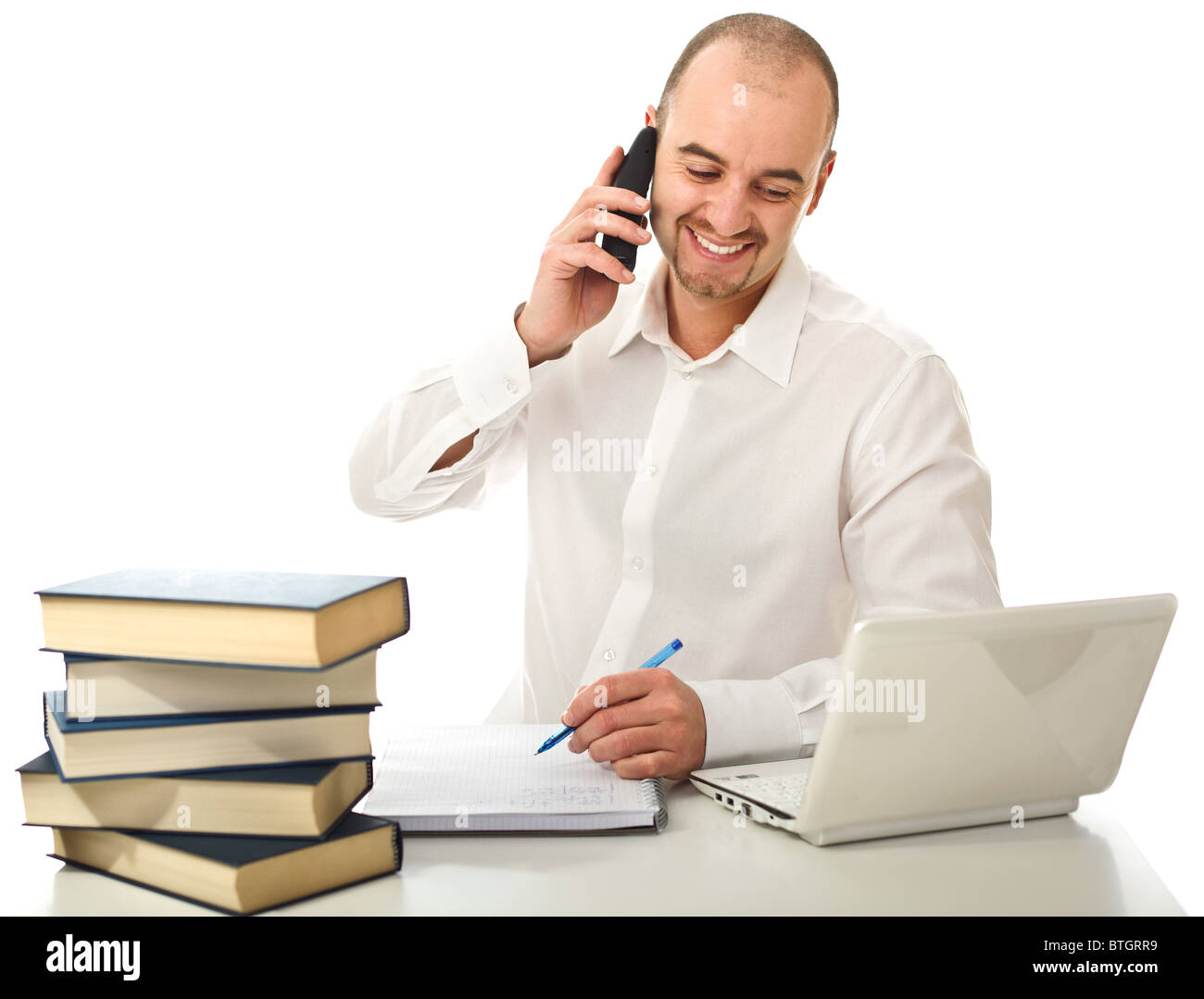 L'homme au travail smiling isolé sur fond blanc Banque D'Images