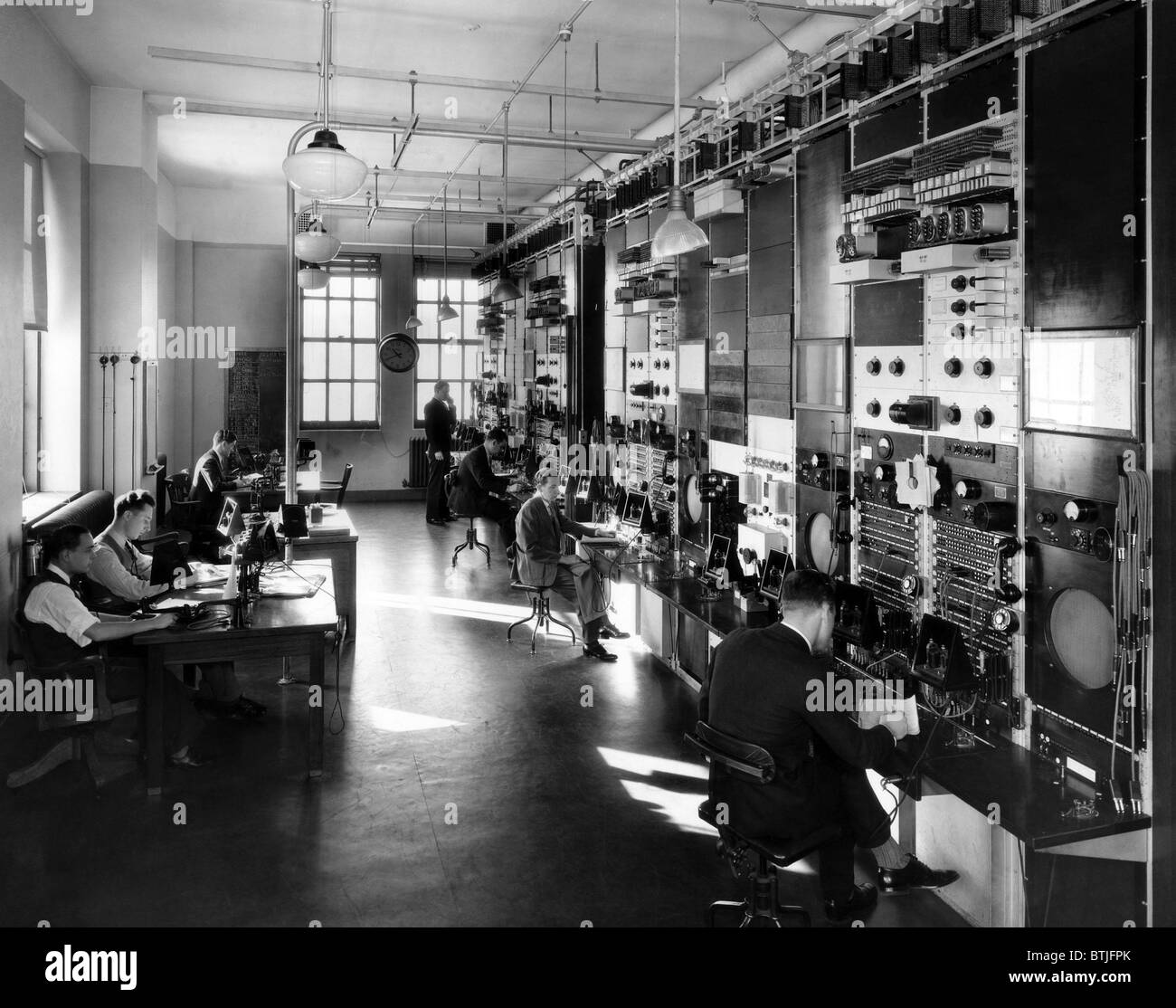 La compagnie de téléphone général du Bureau de contrôle, New York, vers 1935. Archives CSU/avec la permission d'Everett Collection Banque D'Images