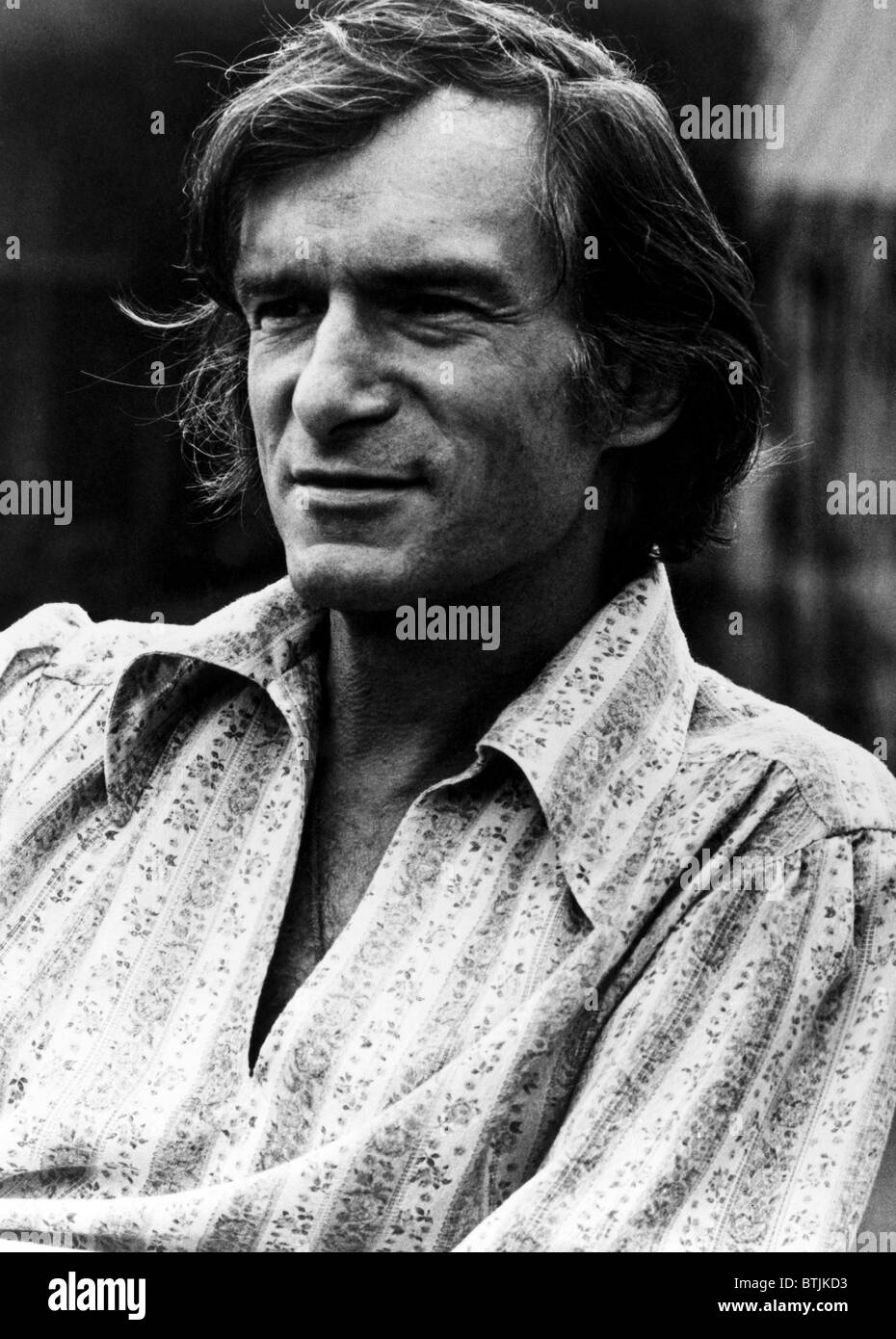 Hugh Hefner ca des années 1970. Avec la permission des Archives CSU/Everett Collection. Banque D'Images