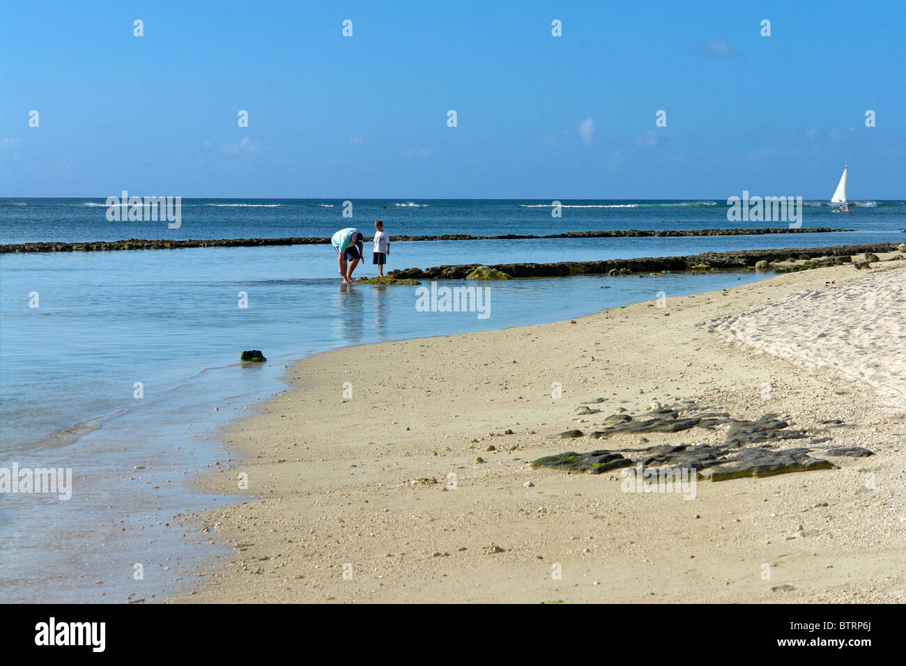 Plage en face de l'hôtel Oberoi, Baie aux Tortues, l'île Maurice Photo