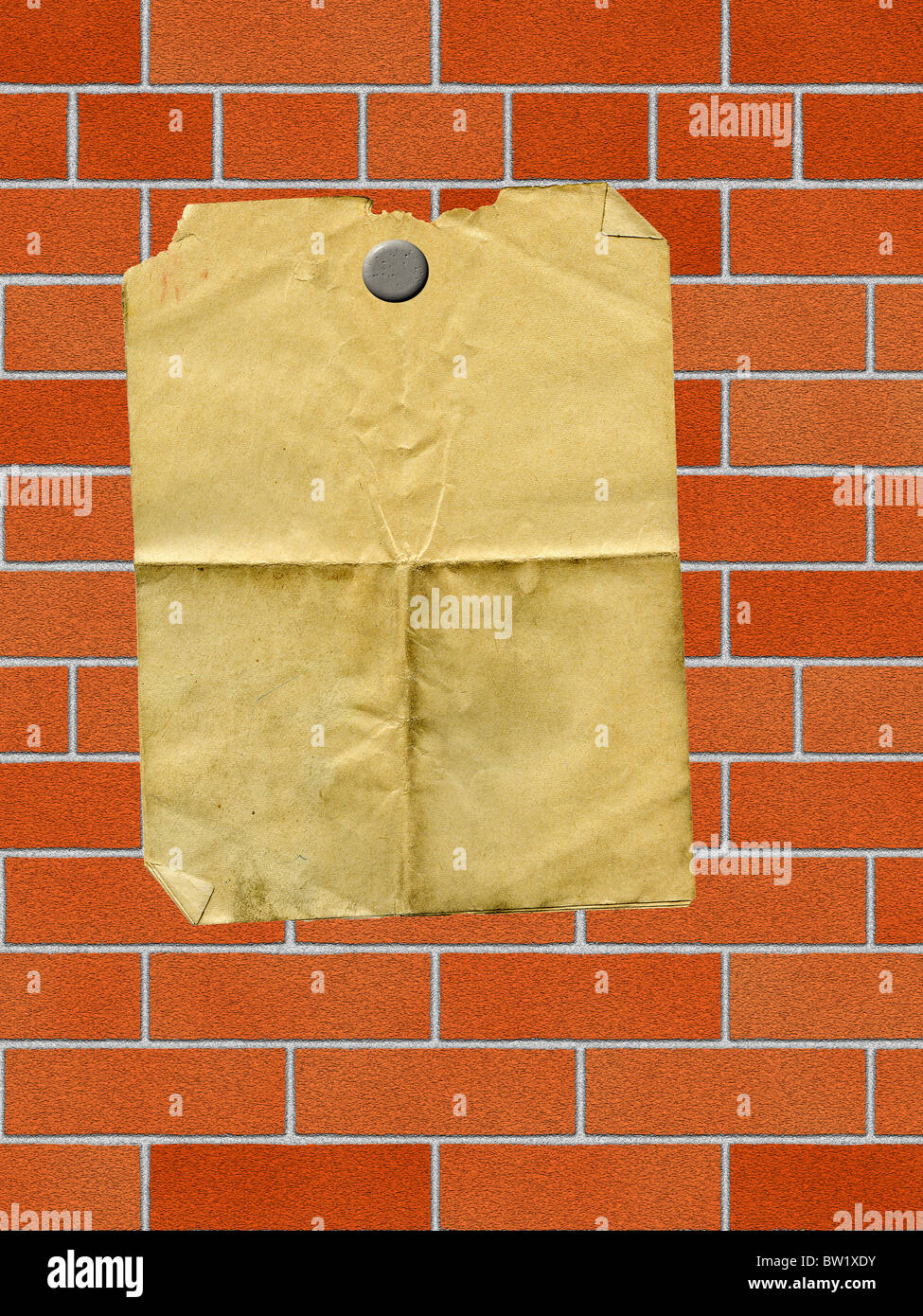 Une sale de feuilles de papier collées sur un mur de briques Banque D'Images