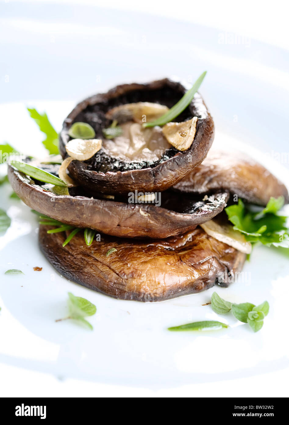 Champignons Portobello cuits Banque D'Images