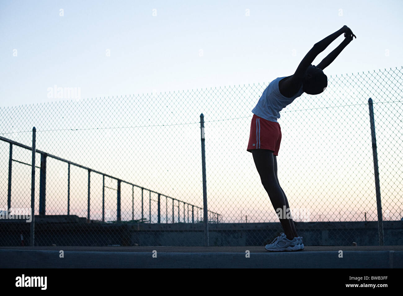 Runner stretching Banque D'Images