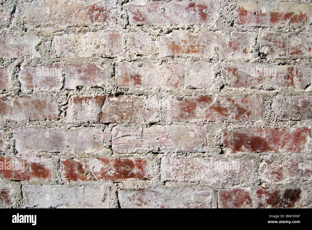 Très vieux mur de briques rouges au Caire. Fond texturé. Banque D'Images