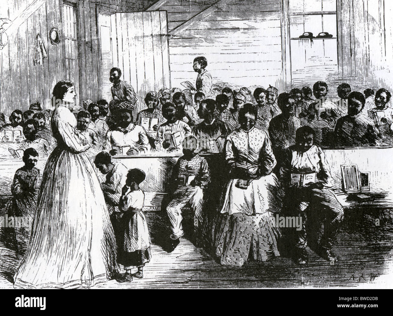 Le BUREAU DU FREEDMEN pour l'école d'anciens esclaves à Vicksburg, Mississippi en 1866 avec un professeur blanc du Nord Banque D'Images