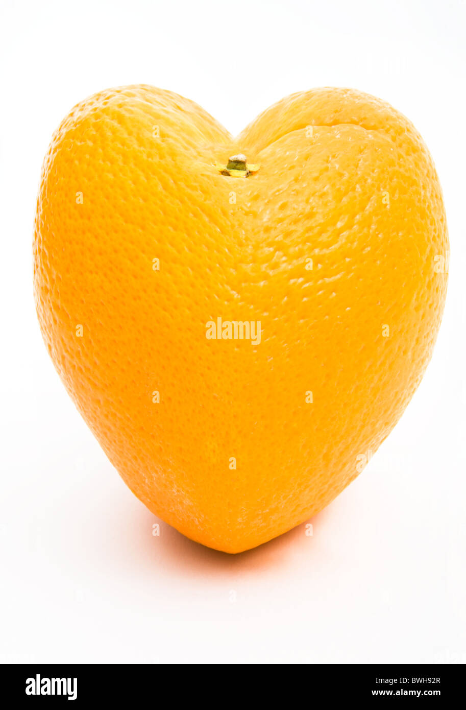Formé en forme de coeur d'Orange - Un régime sain Banque D'Images