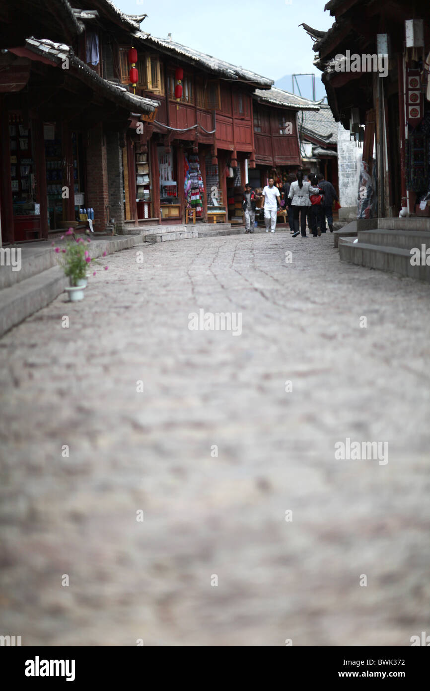 Les rues pavées de la vieille ville de Lijiang, Yunnan Province, China. Banque D'Images