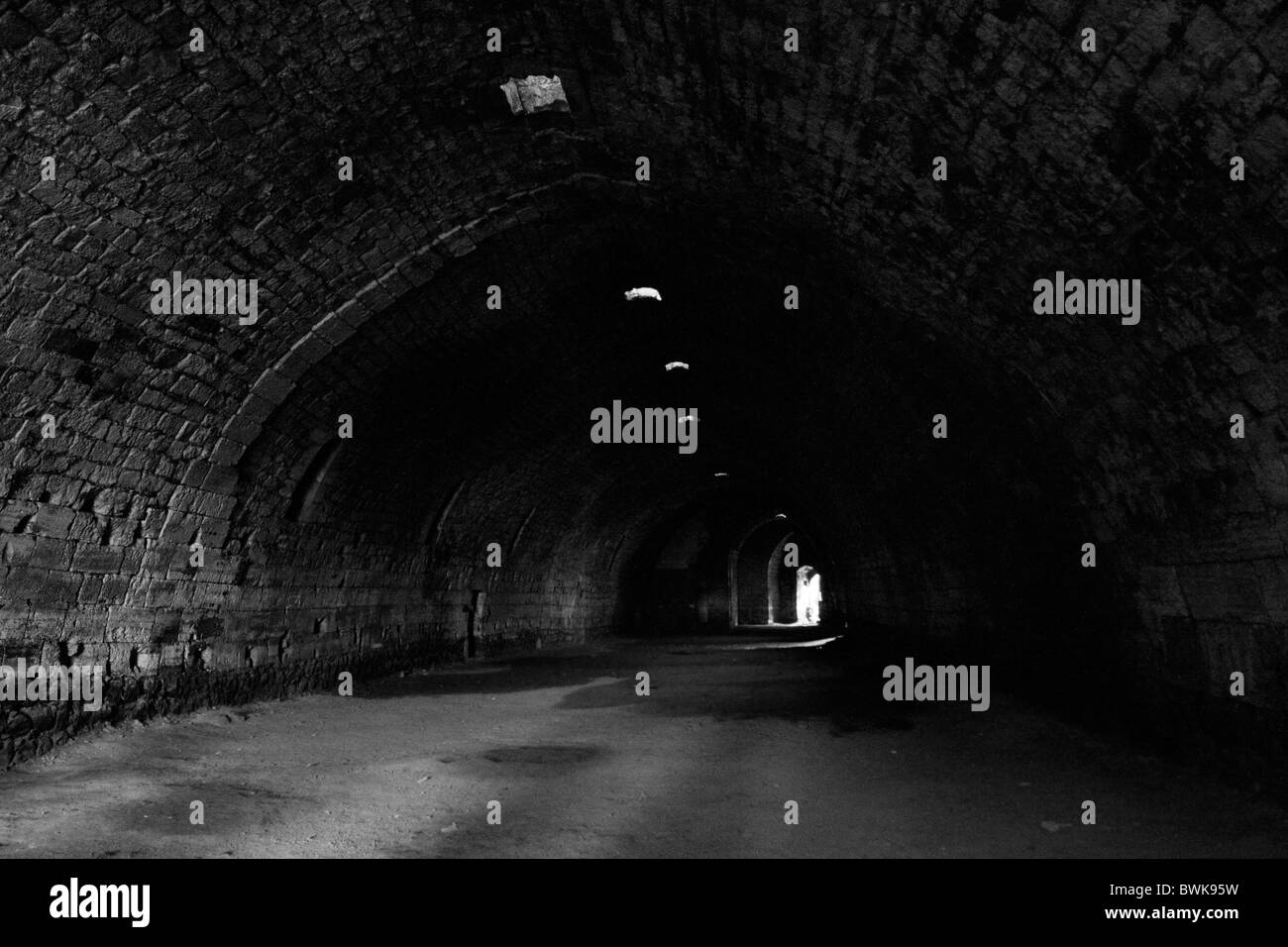 Tunnel sombre et du puits de l'intérieur Crac du Chevalier château dans le gouvernorat de Homs, en Syrie. Banque D'Images