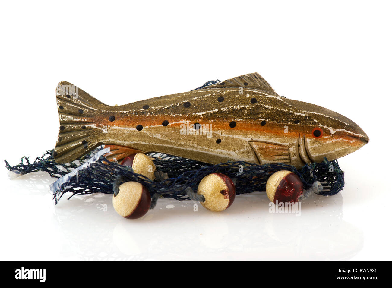 Poisson en bois et net isolated over white Banque D'Images