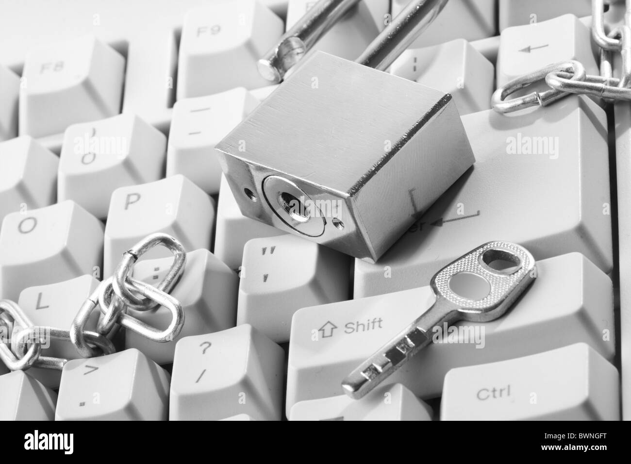 Clavier ordinateur sécurisé avec chaîne et cadenas Banque D'Images