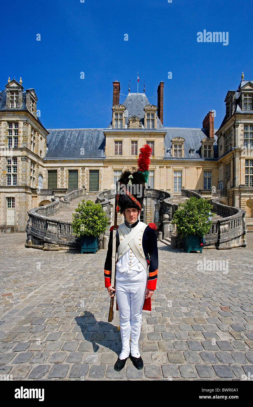 France Europe Fontainebleau UNESCO World Heritage architecture bâtiment guard costume historique homme s Banque D'Images