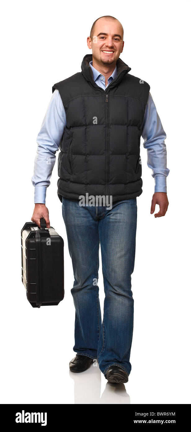 Smiling walking man avec boîtier noir isolated on white Banque D'Images